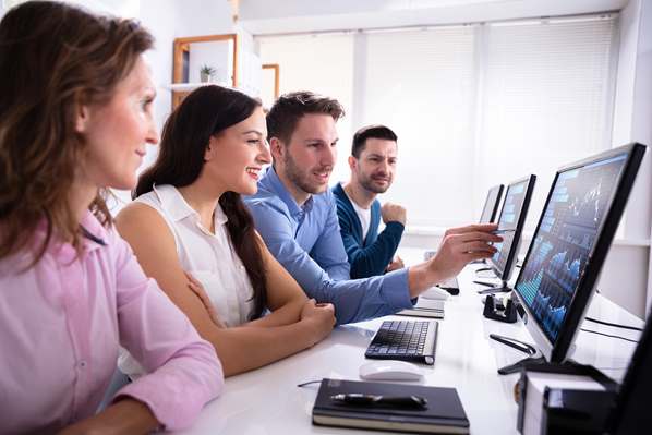 Managers looking at customer data