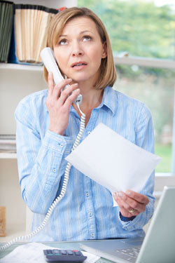 Angry client on telephone